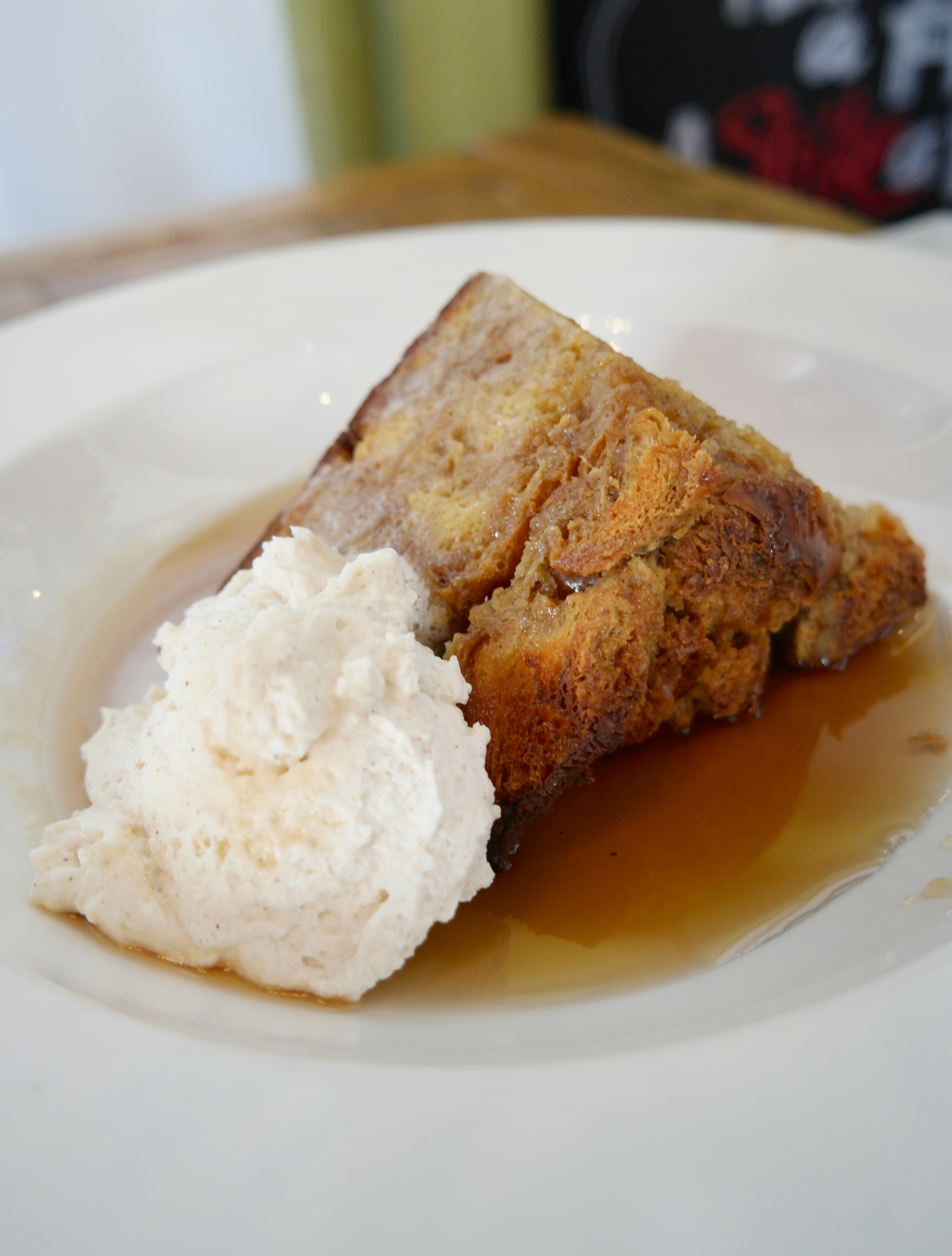 Wood-fired French Toast with Bourbon Syrup and cinnamon Chantilly whipped cream